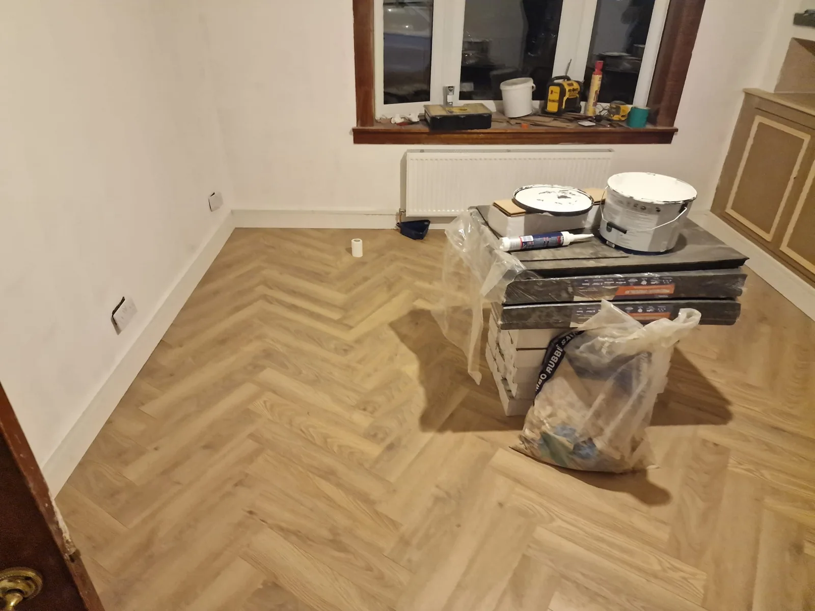 Herringbone timber-look flooring